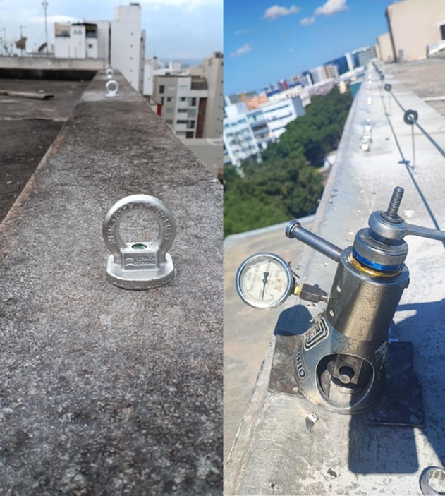 Trabalhador conectado a linha de vida em manutenção de cobertura
